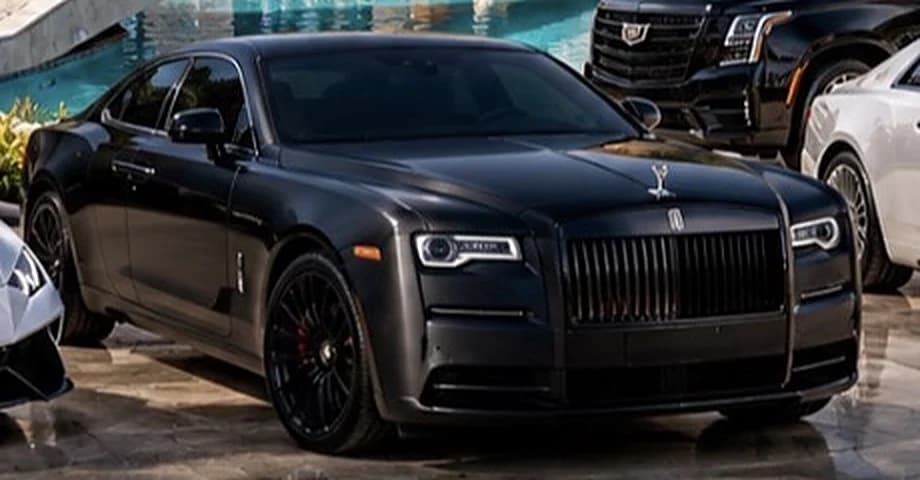 Front detail of a black Rolls-Royce coupé